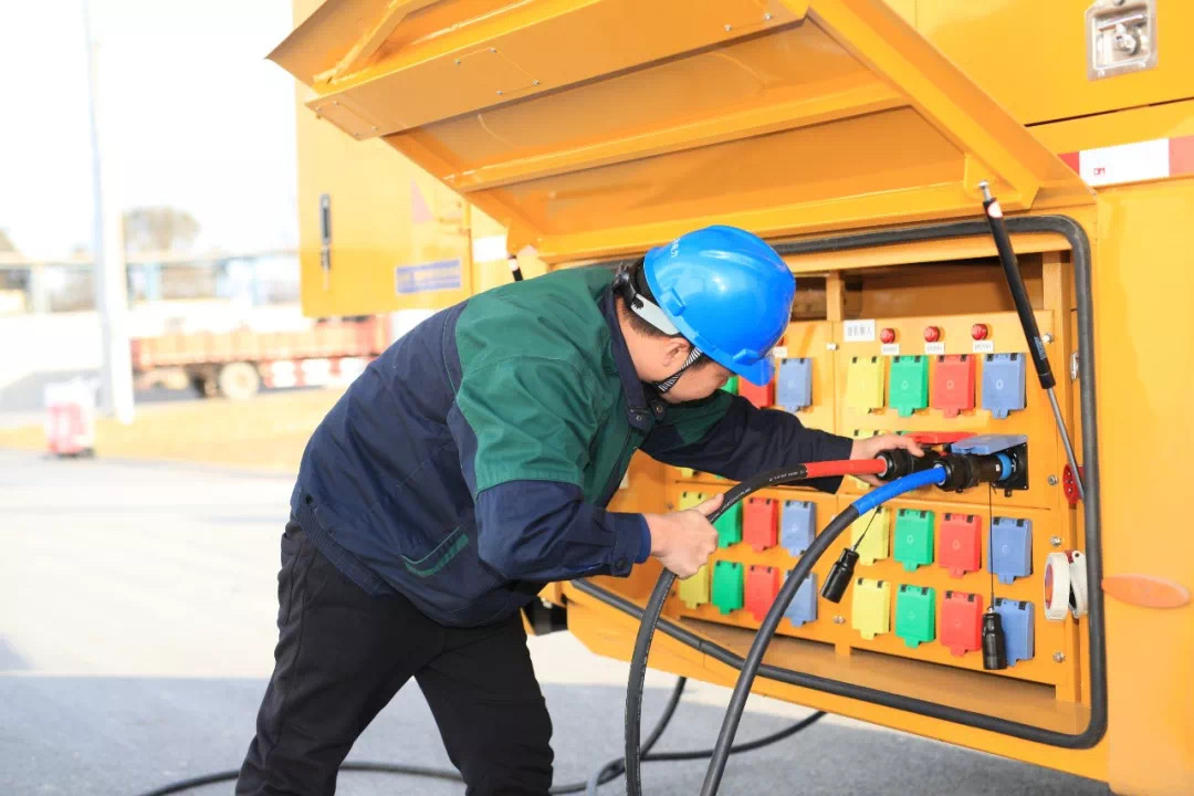 Engineers inspecting a connector mold in the factory