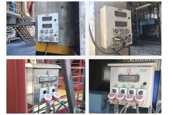 Industrial Power Plug Safety An industrial heavy-duty connector being safely plugged into a power distribution unit on a factory floor.